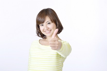 グーサインの女性